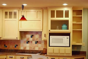 Cabinet Painting in Pearland by Infinite Designs